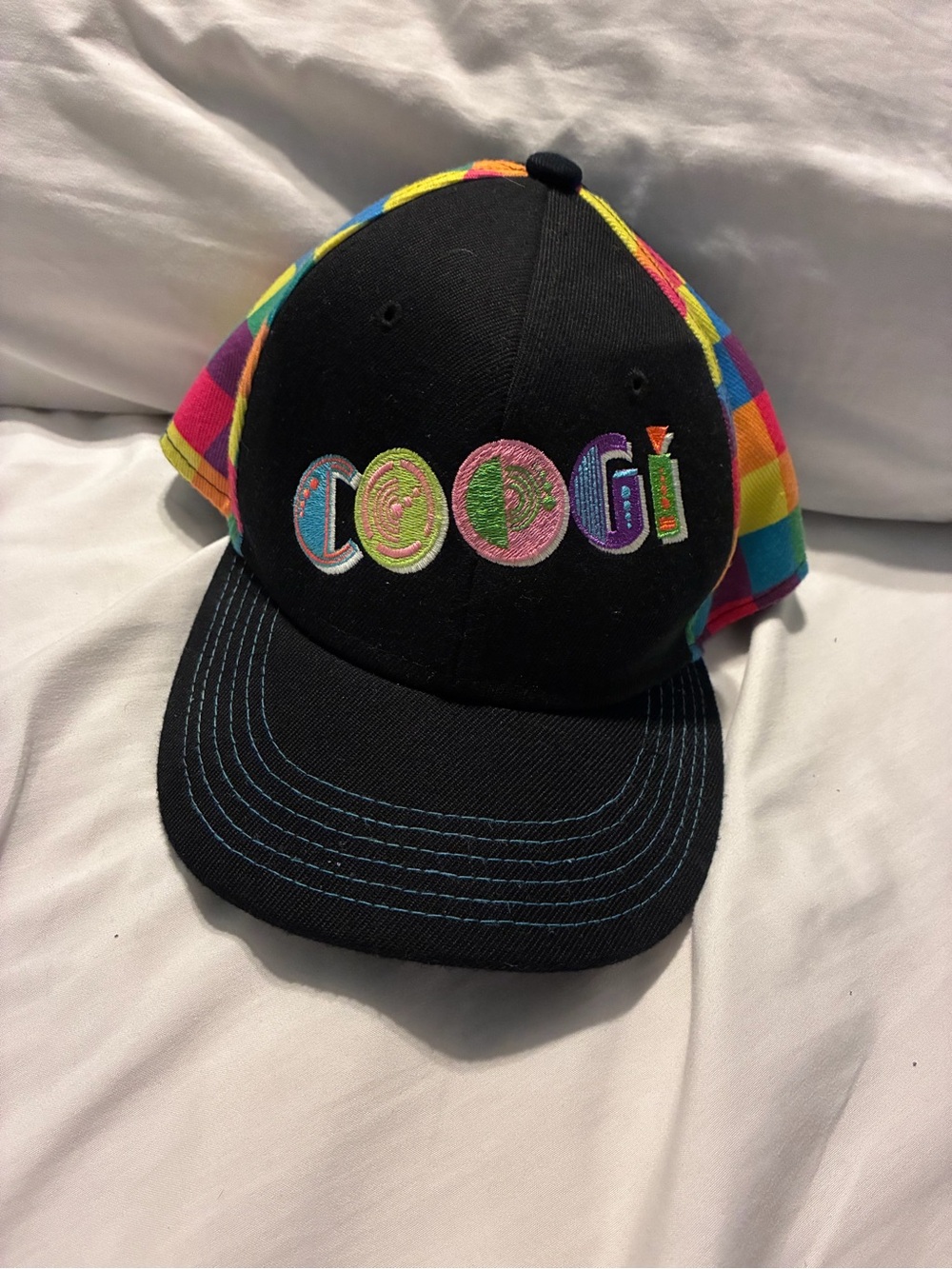 COOGI Black Cap with Rainbow Plaid Panels and Multicolor Embroidered Logo